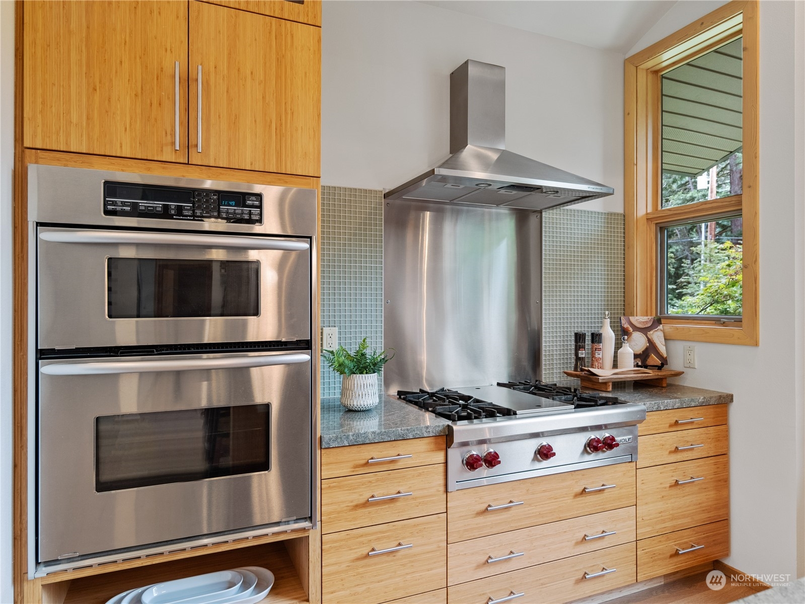 51417 South Riverside Road Gold Bar, WA 98251 - Photo 14 of 40 a kitchen with granite countertop a stove and a microwave