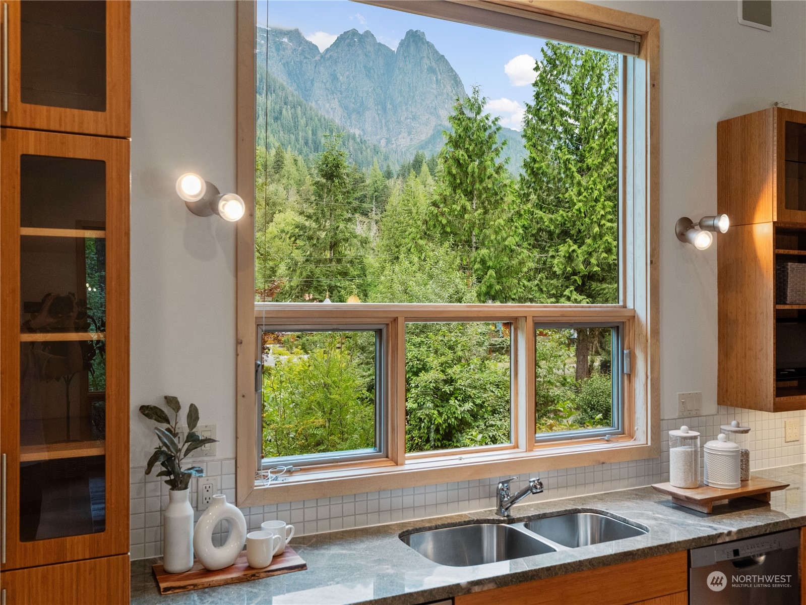 51417 South Riverside Road Gold Bar, WA 98251 - Photo 15 of 40 a kitchen with a large window and sink