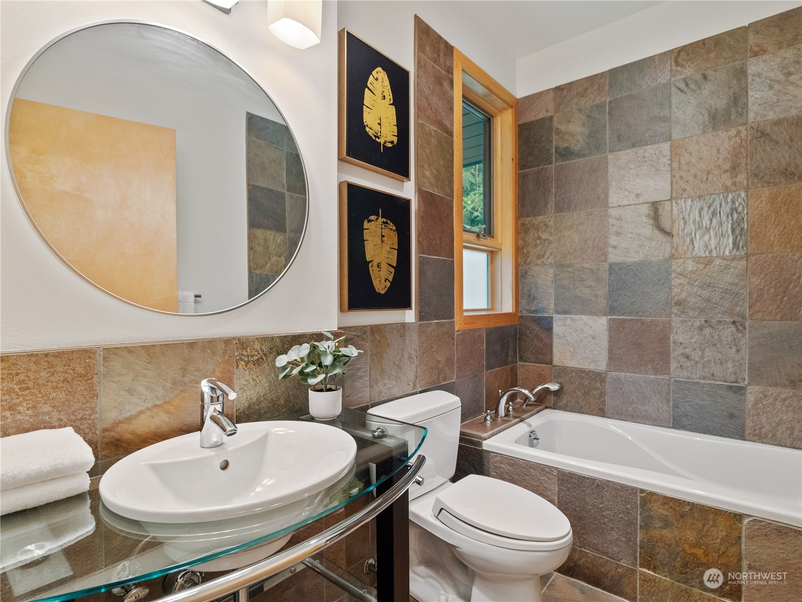 51417 South Riverside Road Gold Bar, WA 98251 - Photo 23 of 40 a bathroom with a sink and a mirror