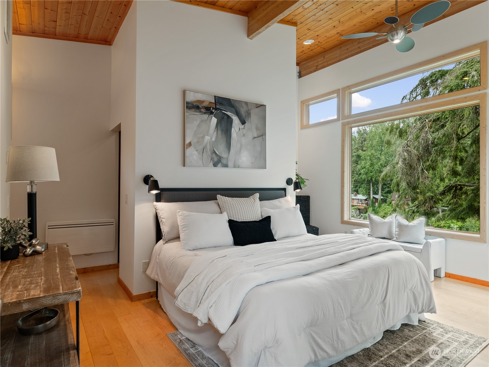 51417 South Riverside Road Gold Bar, WA 98251 - Photo 24 of 40 a bedroom with a bed and a large window