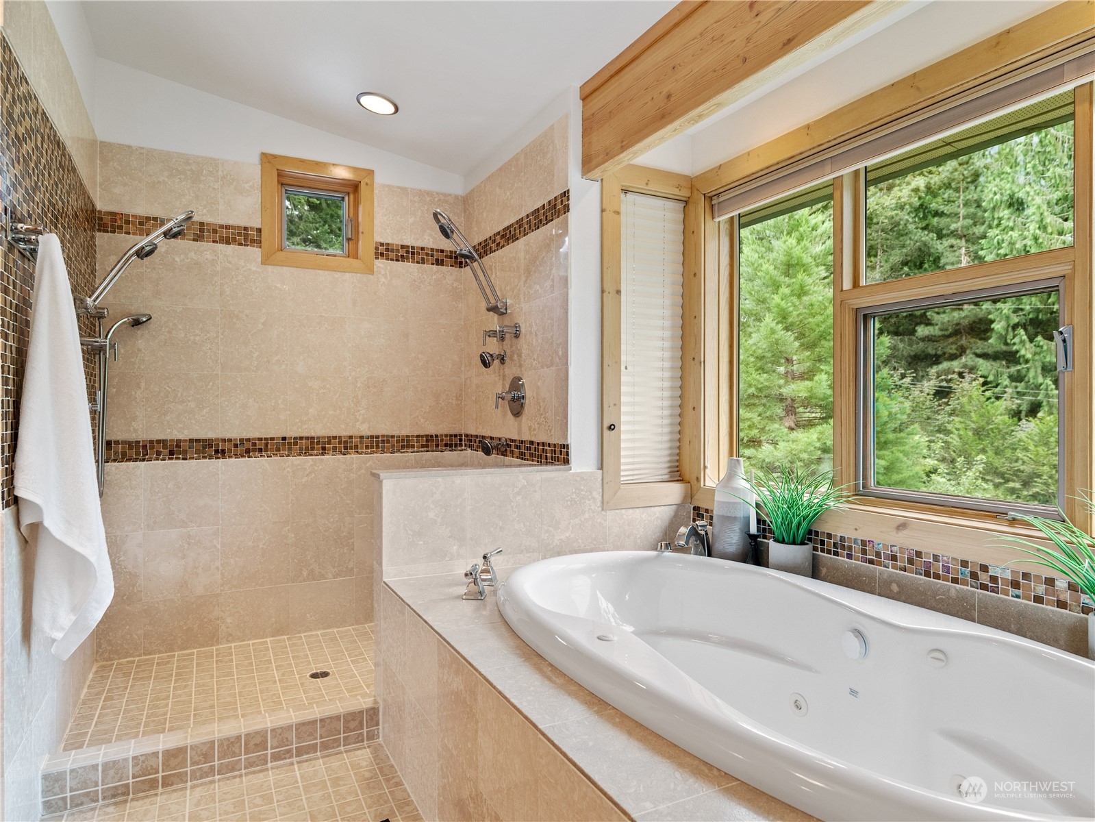 51417 South Riverside Road Gold Bar, WA 98251 - Photo 27 of 40 a bathroom with a bathtub and a shower