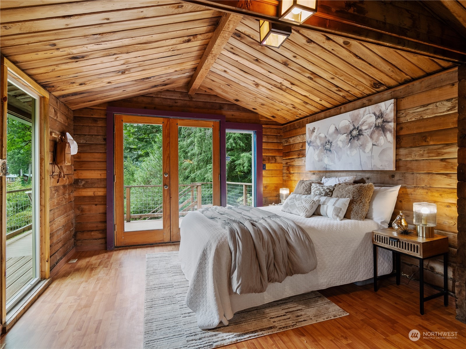 51417 South Riverside Road Gold Bar, WA 98251 - Photo 35 of 40 a bed sitting in a bedroom next to a window