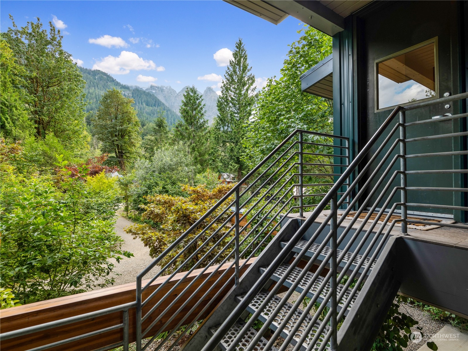 51417 South Riverside Road Gold Bar, WA 98251 - Photo 6 of 40 a view of balcony with a plant