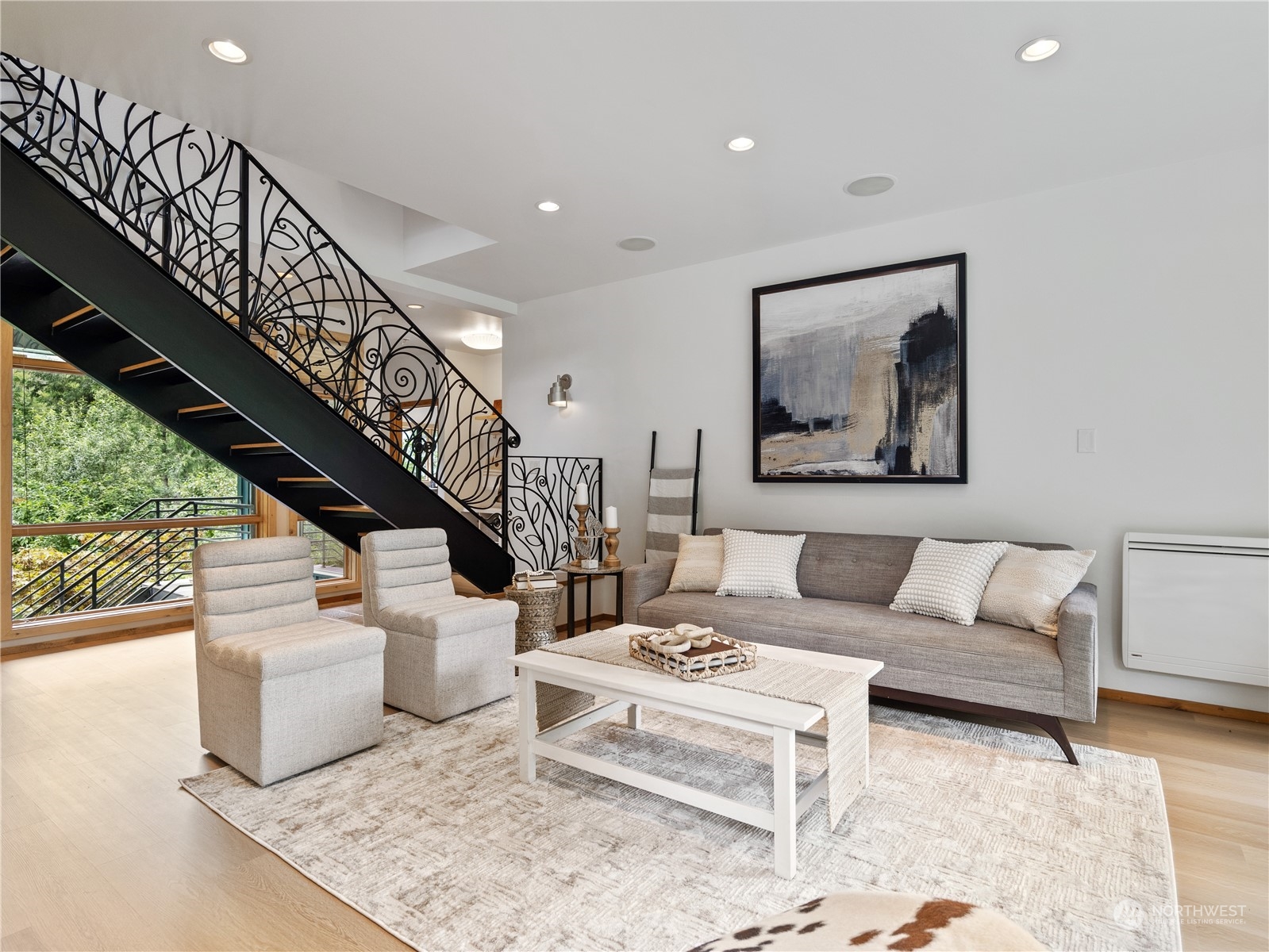 51417 South Riverside Road Gold Bar, WA 98251 - Photo 9 of 40 a living room with furniture and stairs