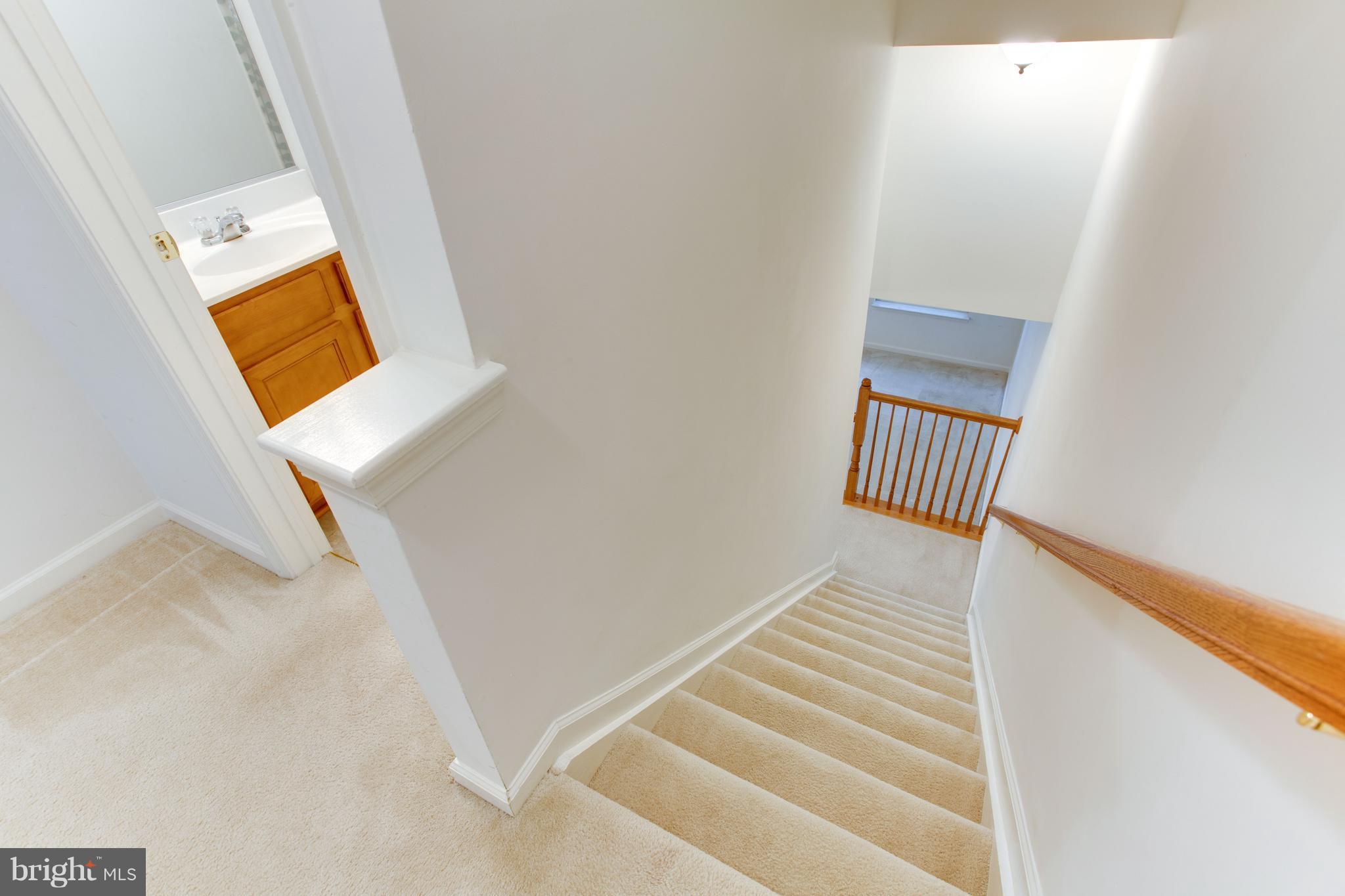 6020 Machen Road, Unit 177 Centreville, VA 20121 - Photo 17 of 30 a view of a room with wooden floor and white walls