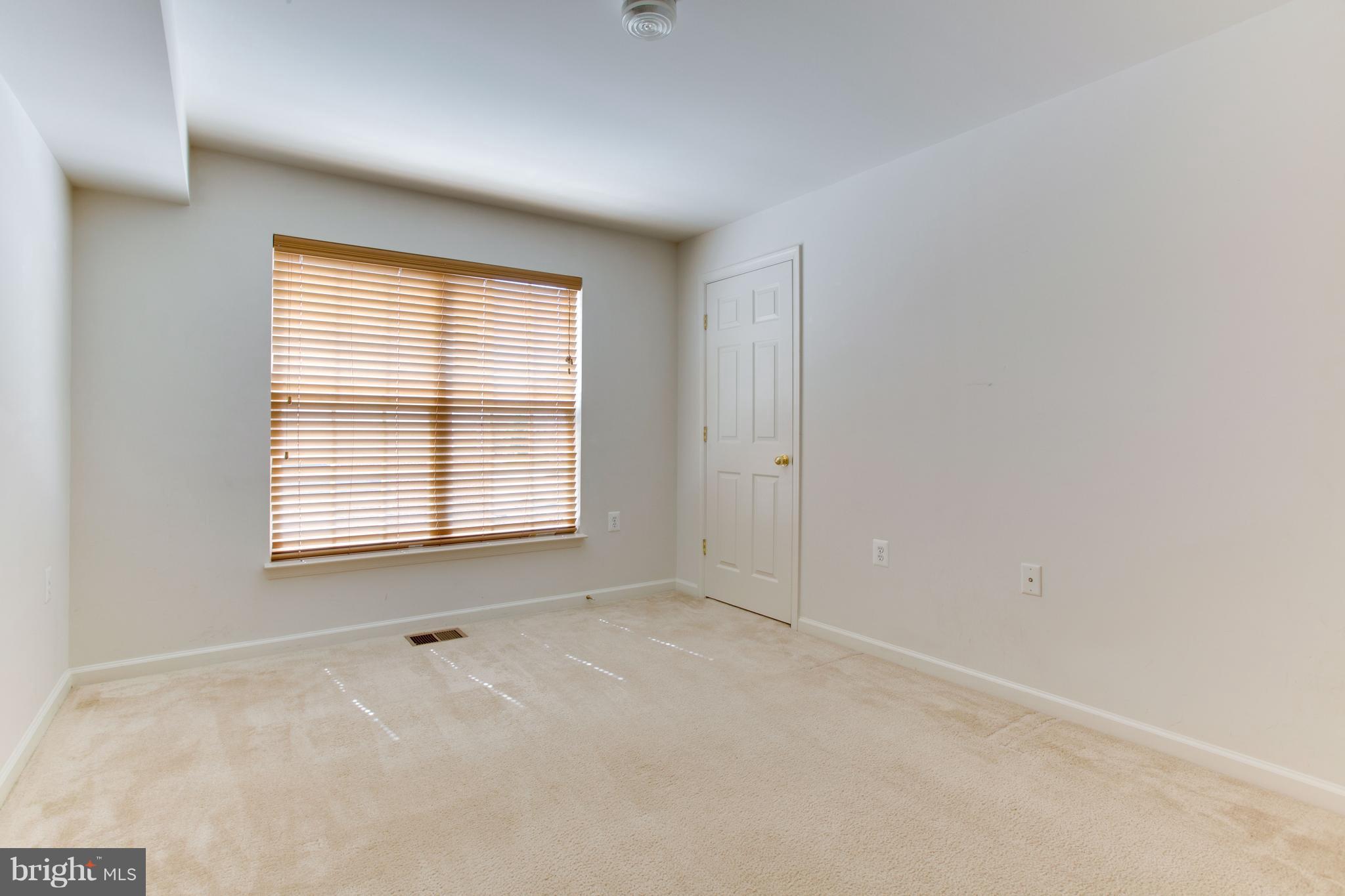 6020 Machen Road, Unit 177 Centreville, VA 20121 - Photo 20 of 30 a view of an empty room with a window