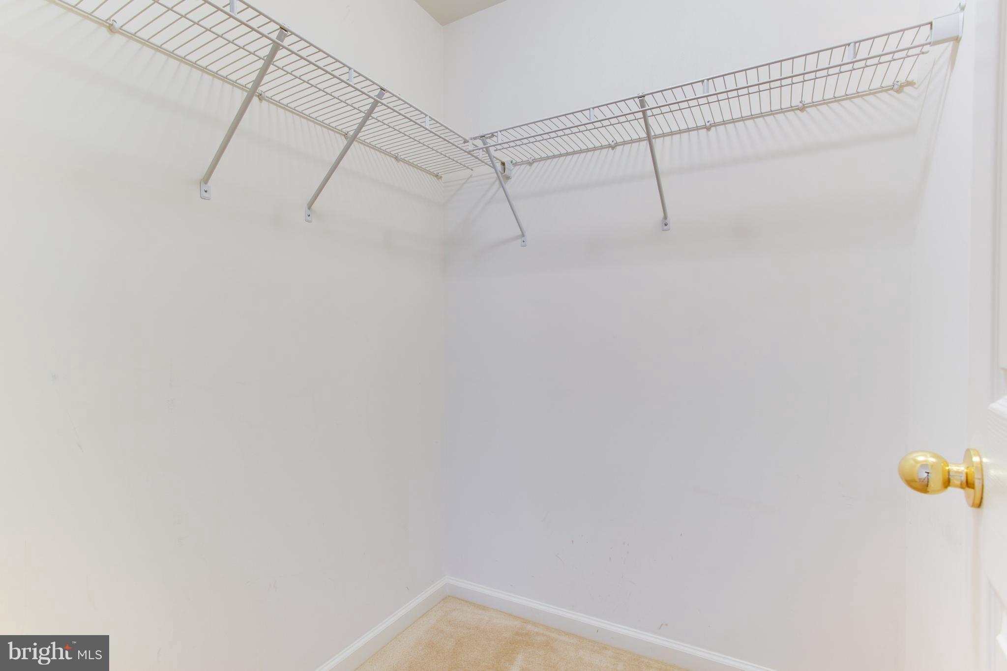6020 Machen Road, Unit 177 Centreville, VA 20121 - Photo 25 of 30 a view of a room with racks on the wall