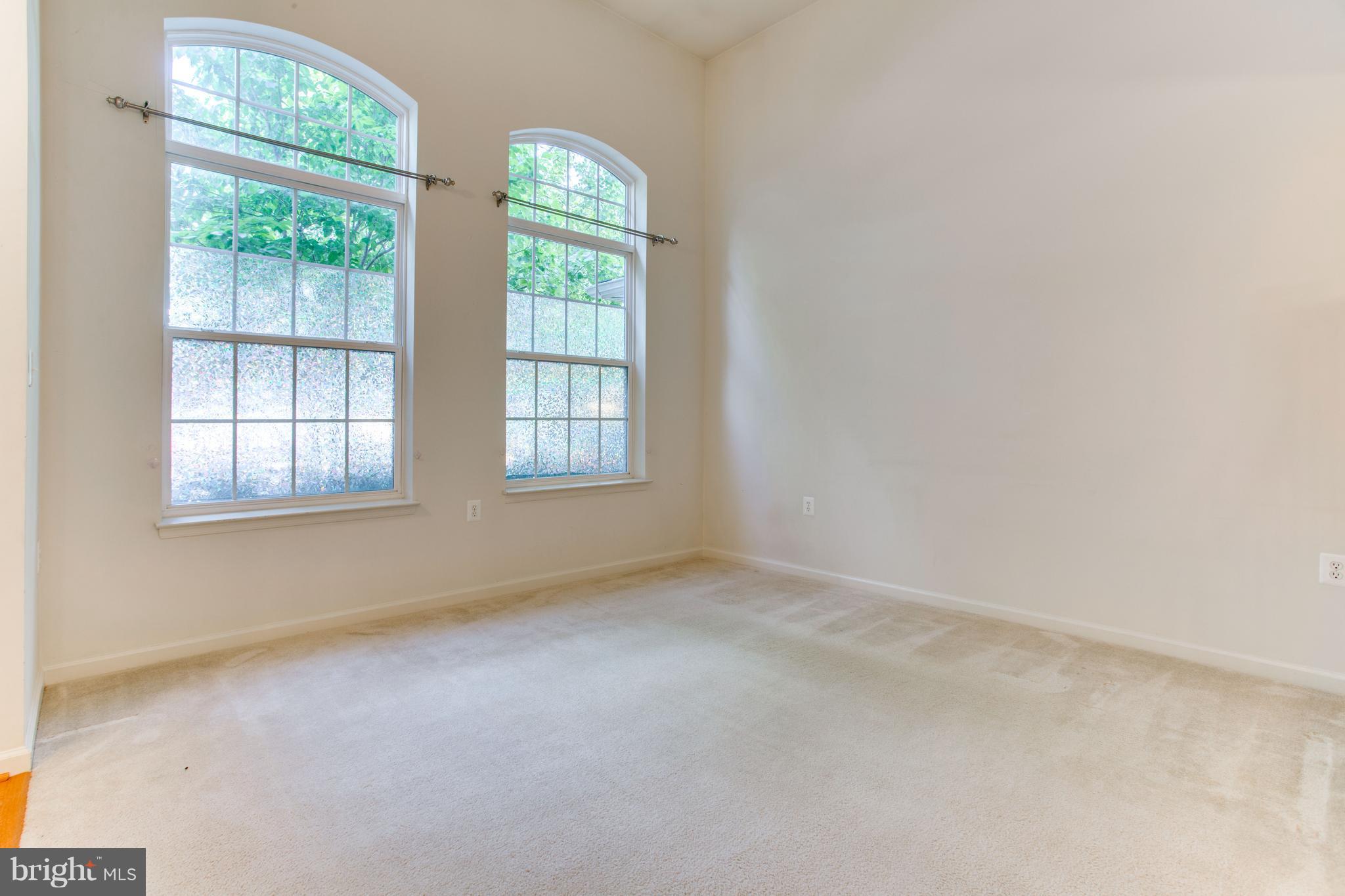 6020 Machen Road, Unit 177 Centreville, VA 20121 - Photo 5 of 30 an empty room with windows