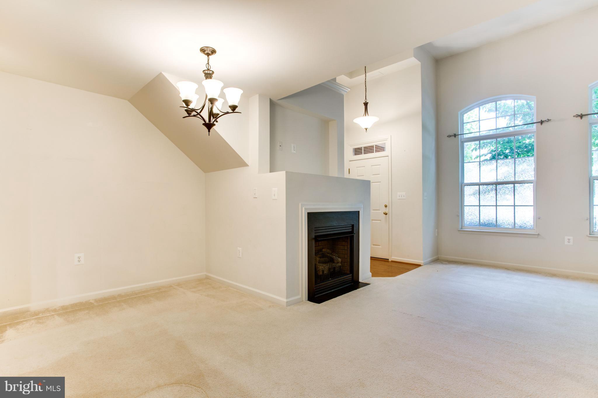 6020 Machen Road, Unit 177 Centreville, VA 20121 - Photo 10 of 30 a view of empty room with a fireplace
