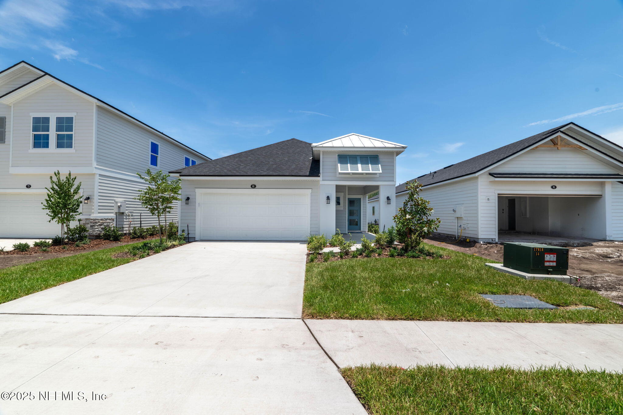 81 Ripple Road St. Augustine, FL 32095 - Photo 2 of 94 a front view of a house with a garden