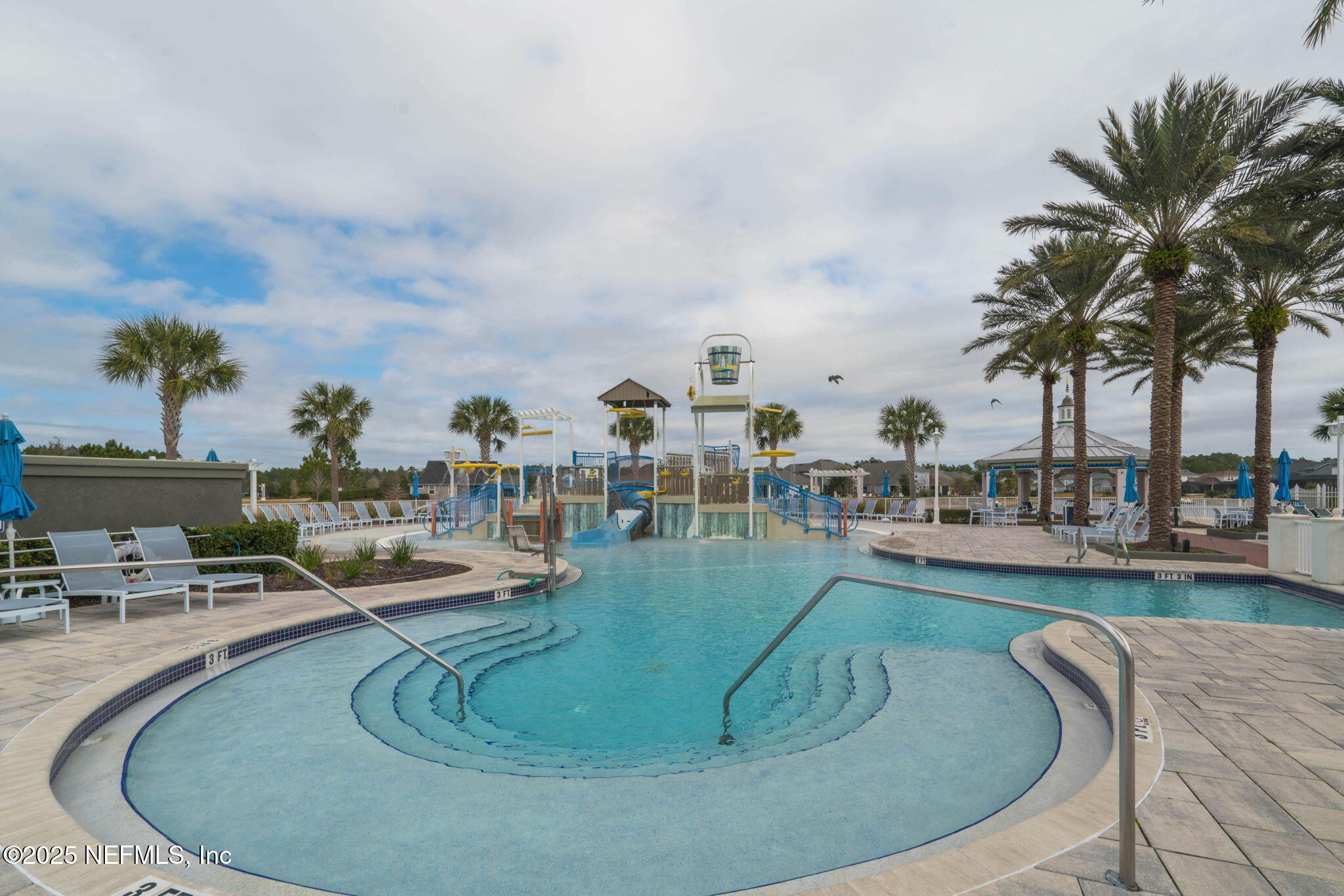 81 Ripple Road St. Augustine, FL 32095 - Photo 62 of 94 a view of a swimming pool with outdoor seating