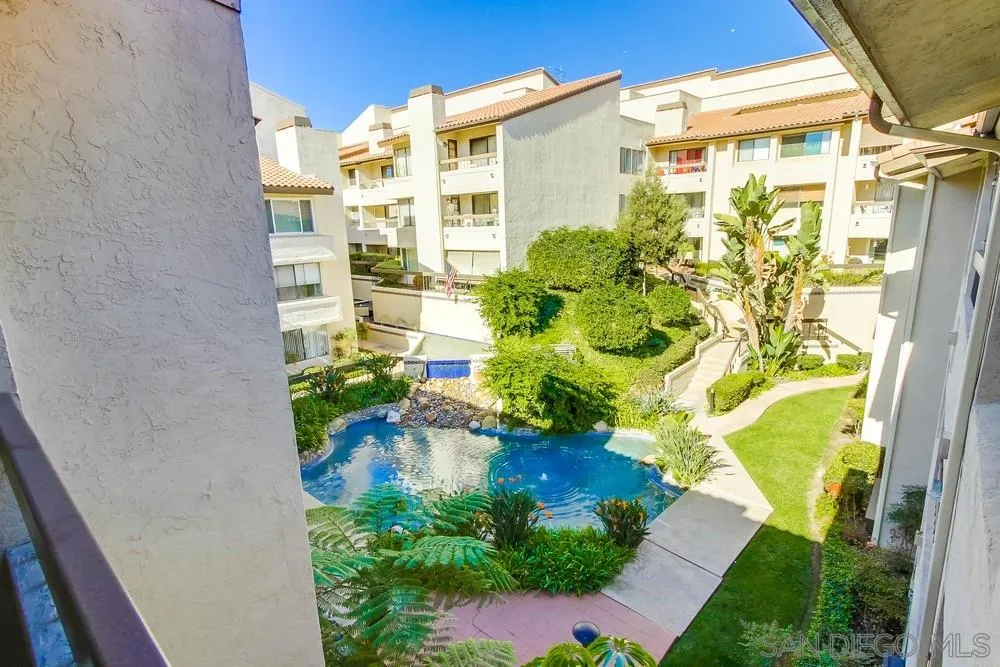 6767 Friars Road, Unit 150 San Diego, CA 92108 - Photo 14 of 20 a front view of a house with a yard