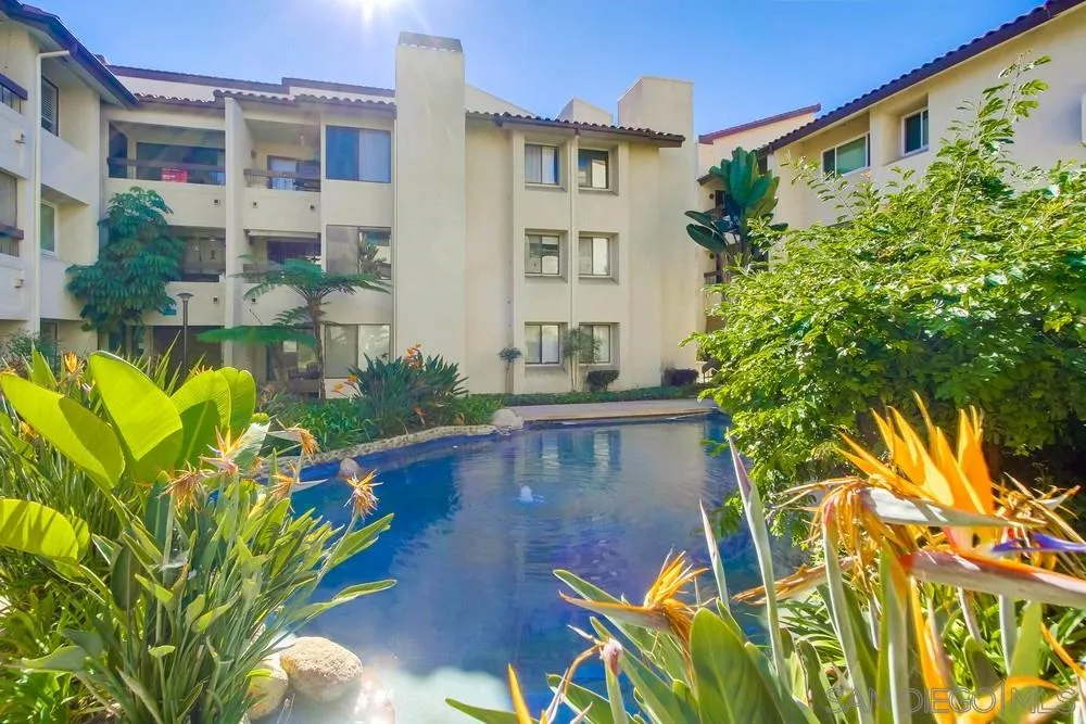 6767 Friars Road, Unit 150 San Diego, CA 92108 - Photo 15 of 20 a house with swimming pool outdoor seating