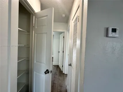a bathroom with a mirror and a shower