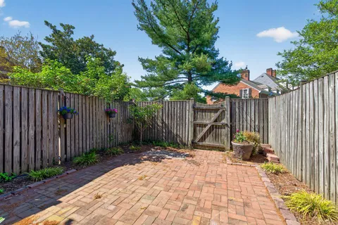 a aerial view of a house with a yard