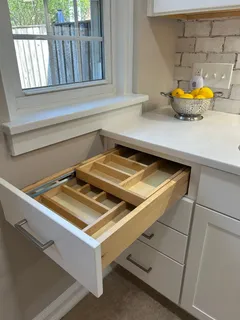 a bedroom with a large bed and a couch