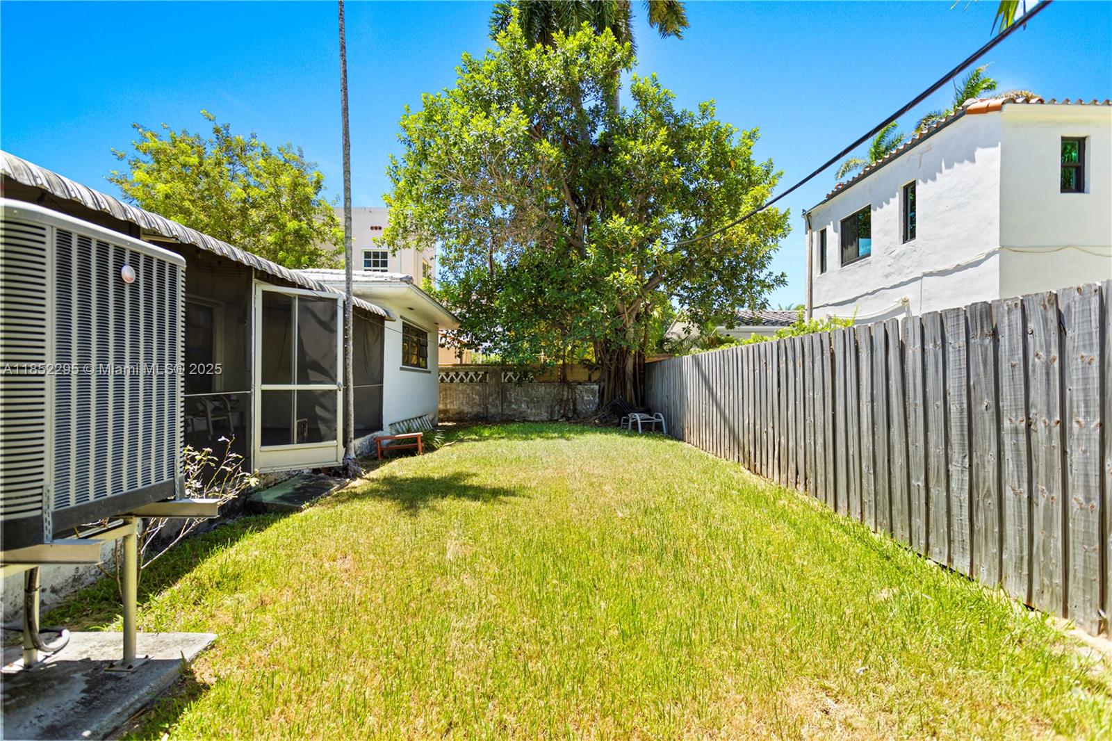 4322 Alton Road Miami Beach, FL 33140 - Photo 20 of 26 a view of a backyard with a small cabin