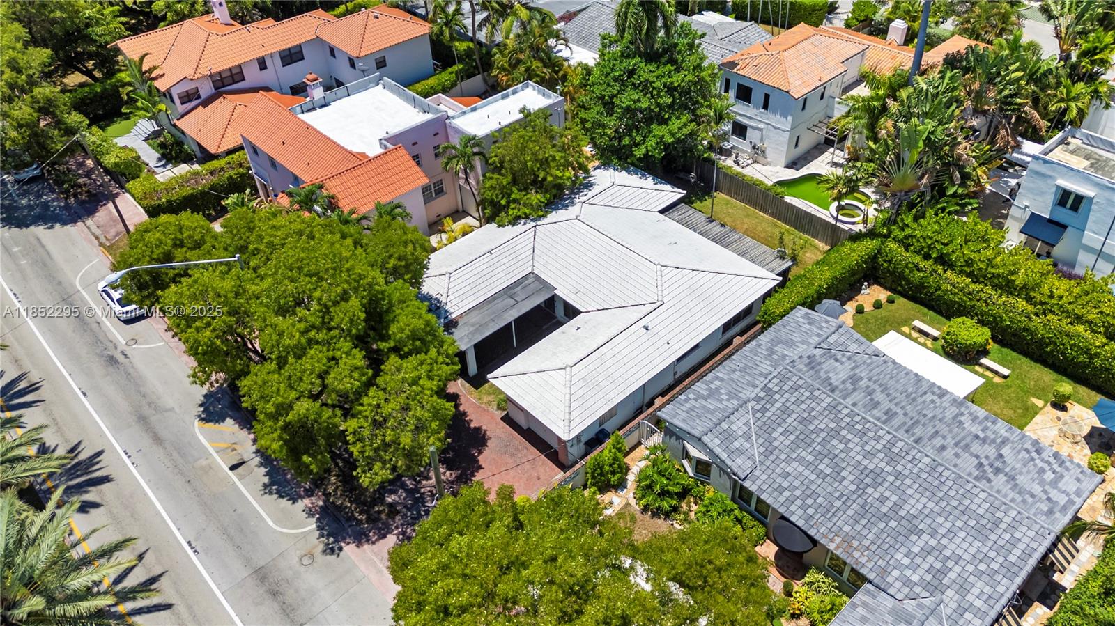4322 Alton Road Miami Beach, FL 33140 - Photo 9 of 26 an aerial view of a house with a garden