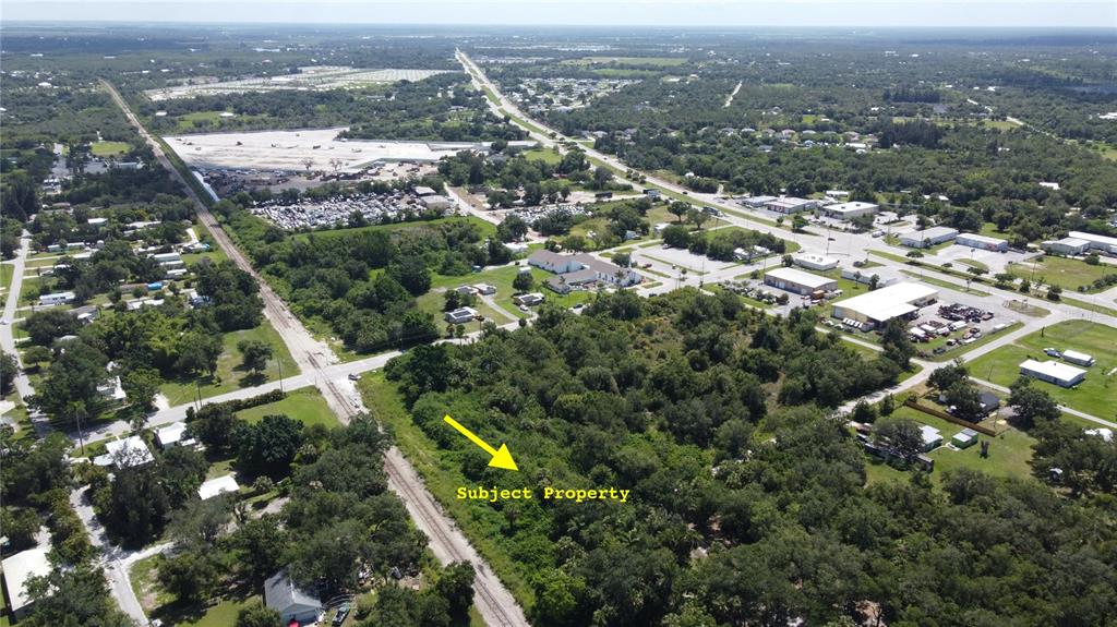 27520 Mitchell Avenue Punta Gorda, FL 33982 - Photo 1 of 3 an aerial view of multiple house