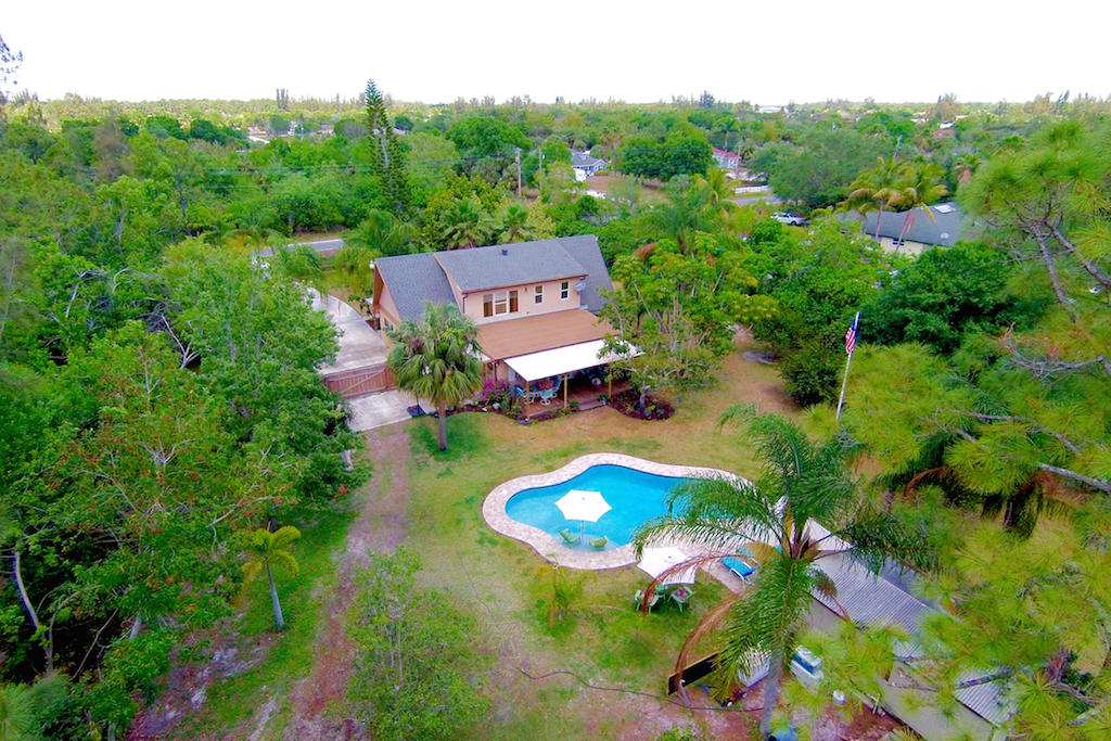 9394 Sandy Run Road Jupiter, FL 33478 - Photo 2 of 33 From the South
