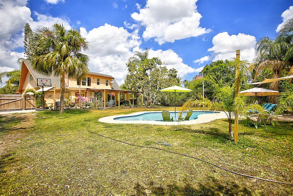 9394 Sandy Run Road Jupiter, FL 33478 - Photo 26 of 33 Pool to Home