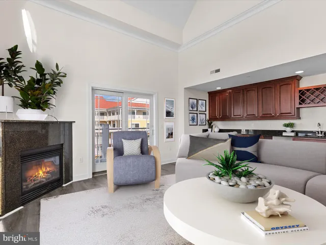 a kitchen with stainless steel appliances granite countertop a sink counter space cabinets and a stove