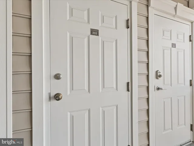 a view of a balcony with wooden floor