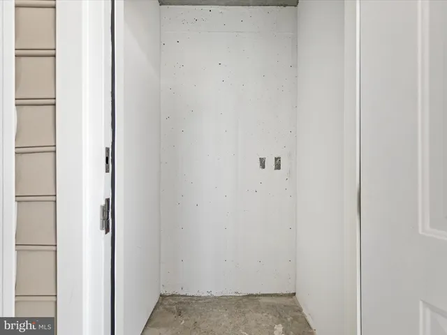 a view of a balcony with wooden floor