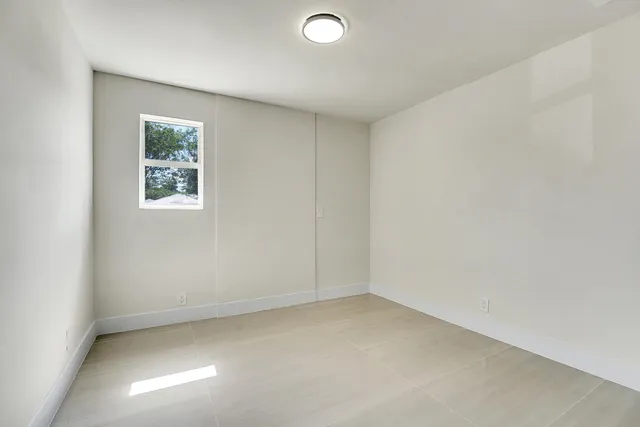 wooden floor and windows in an empty room