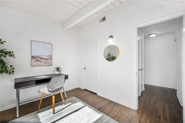 a workspace with wooden floor
