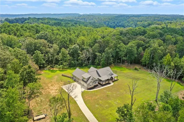 a view of a swimming pool and mountains