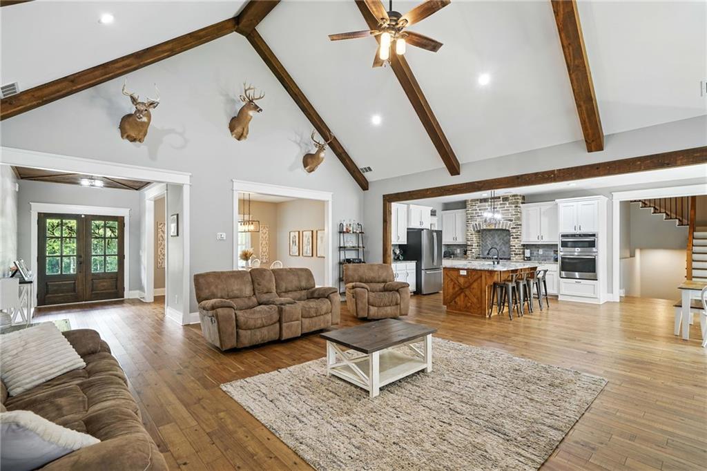 14430 Fincher Road Ball Ground, GA 30107 - Photo 18 of 51 a living room with furniture and wooden floor