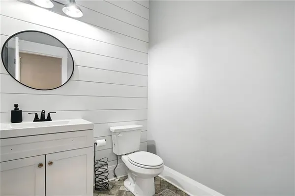 a bedroom with a bed and cabinets