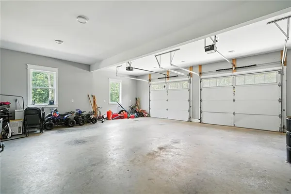 a view of a room with gym equipment and next to a window
