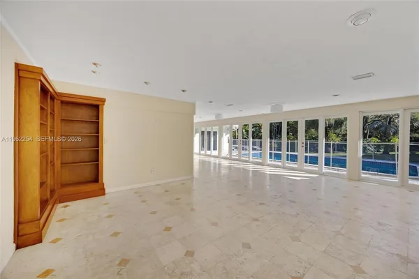 an empty room with windows