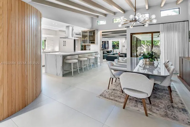 a kitchen that has a lot of cabinets in it