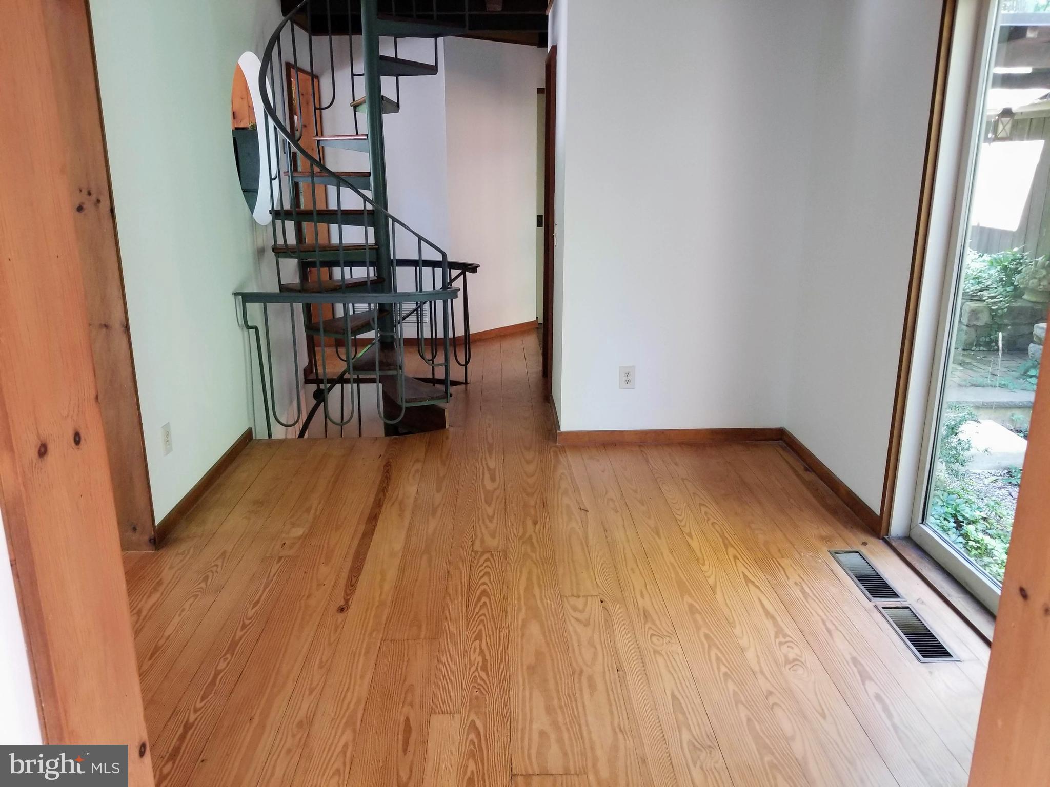 7073 Ely Road New Hope, PA 18938 - Photo 13 of 29 Sitting Room To Spiral Stairs