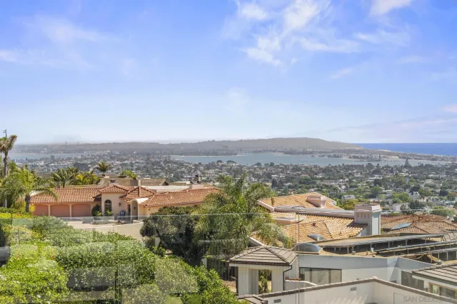 a view of a balcony with furniture