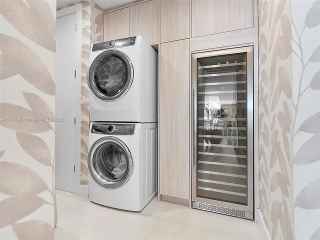 a utility room with washer and dryer