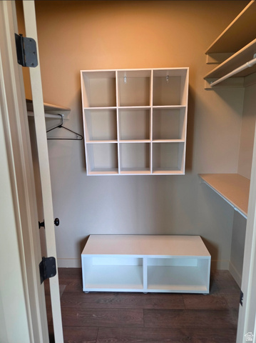 9381 South Sevier Riv Ranch Levan, UT 84639 - Photo 45 of 58 Built-in shelving, wood-finish flooring, white wall-mounted storage cubbies, and integrated lower storage