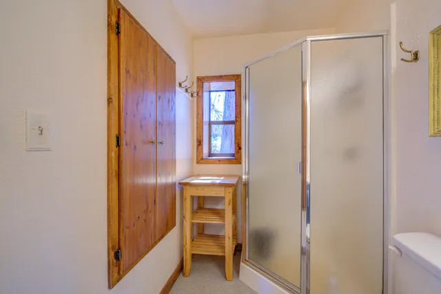 a bathroom with a tub and a shower