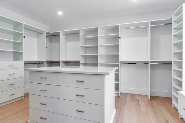 a view of an empty walk in closet