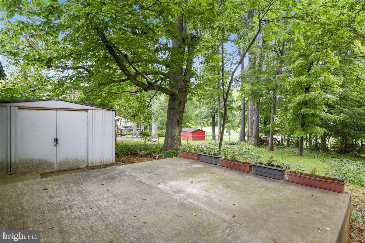 3538 Cornell Road Fairfax, VA 22030 - Photo 12 of 61 Back patio & shed w/view of Army Navy golf course