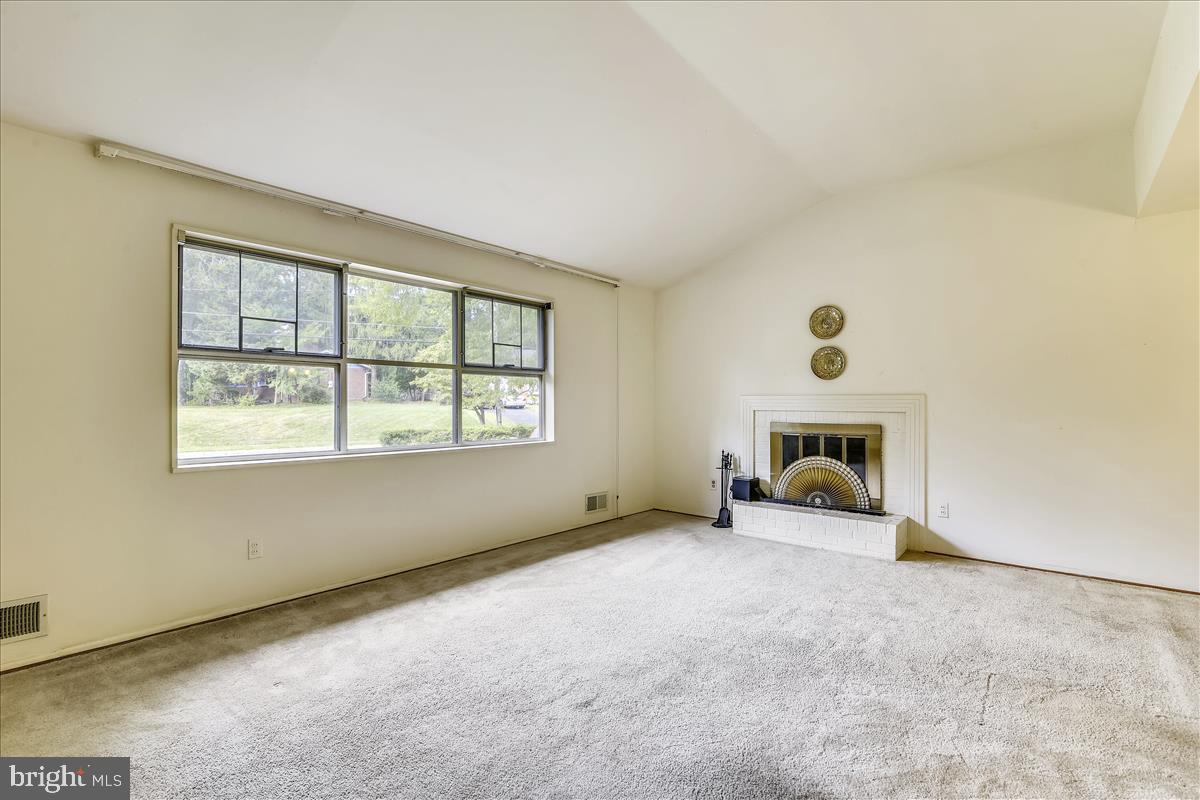 3538 Cornell Road Fairfax, VA 22030 - Photo 26 of 61 Living room and wood burning fireplace