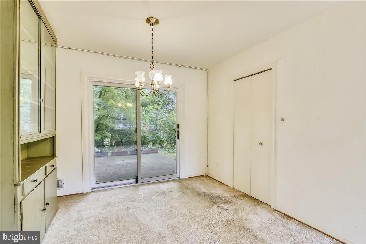 3538 Cornell Road Fairfax, VA 22030 - Photo 30 of 61 Dining Room with hardwood underneath carpet