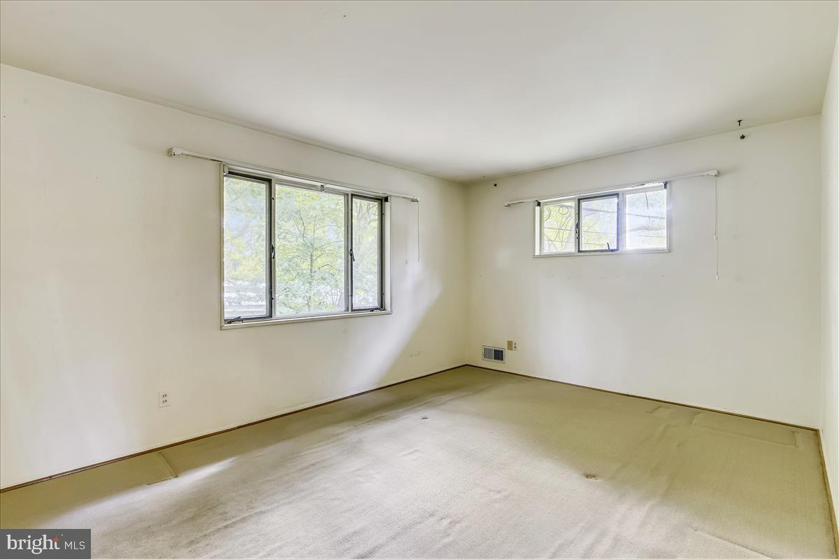 3538 Cornell Road Fairfax, VA 22030 - Photo 32 of 61 Master bedroom with hardwood underneath carpet