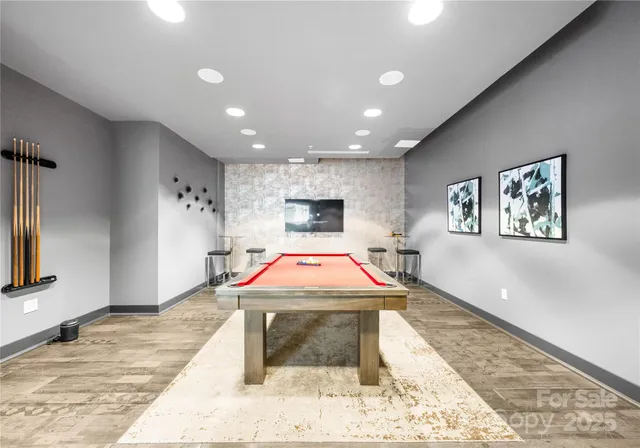 a view of a dining room with furniture wooden floor and a rug