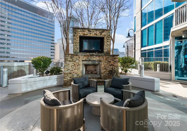 a large white building with a view of balcony
