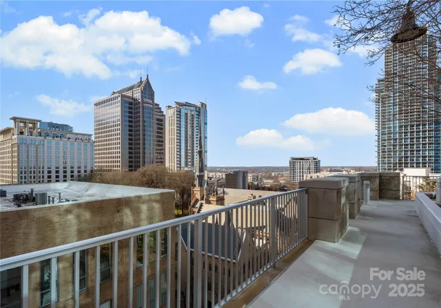 a view of balcony with furniture