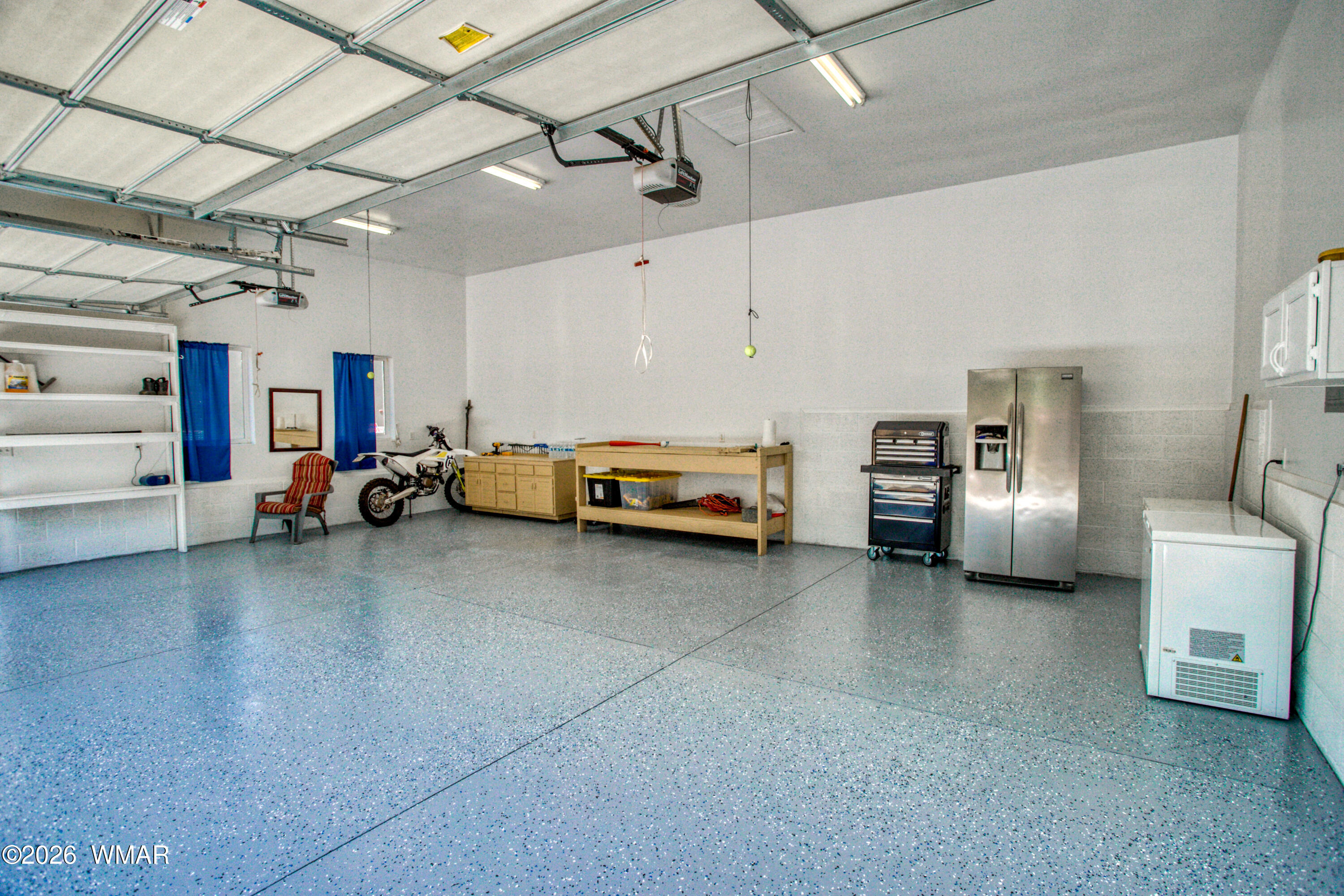 951 Cheney Ranch Loop Show Low, AZ 85901 - Photo 29 of 54 3 car garage new epoxy floors